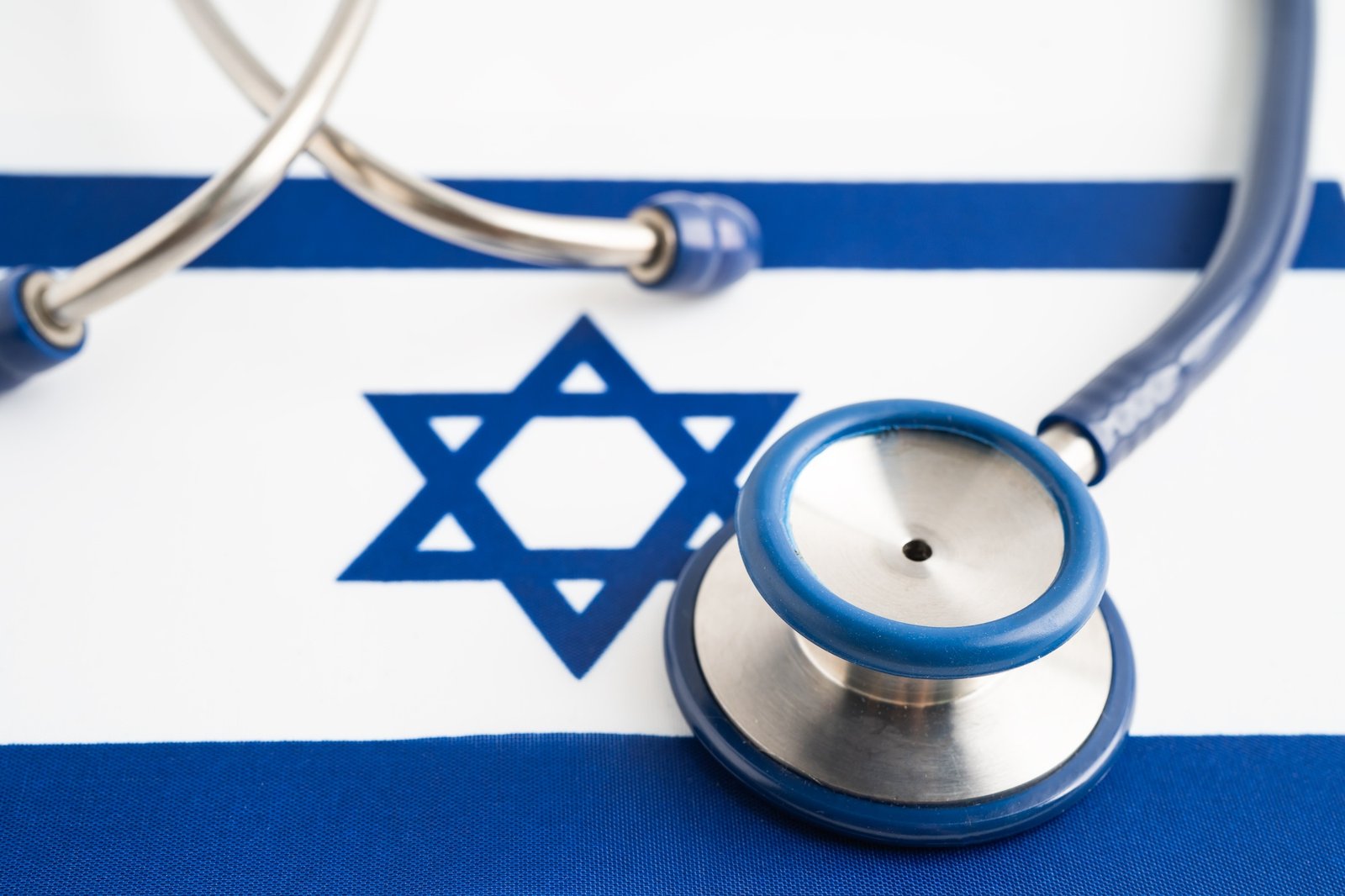 Stethoscope on Israel flag background, Business and finance concept.